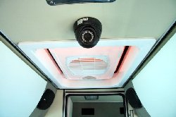 Bus # 392 interior: comfortable chairs, 4 flatscreen TV's, toilet